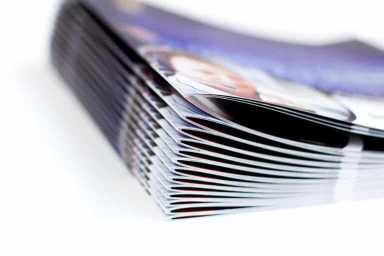 Saddle stitch binding on marketing brochures